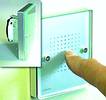 Figure 4. This wall-switch control has a solid glass sheet touch surface